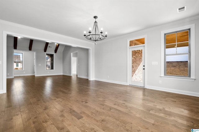 unfurnished living room featuring ornamental molding, beam ceiling, a chandelier, and hardwood / wood-style floors