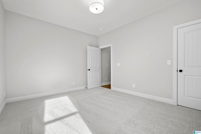 unfurnished bedroom featuring carpet