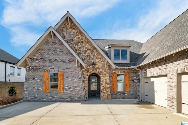 view of front of property with a garage