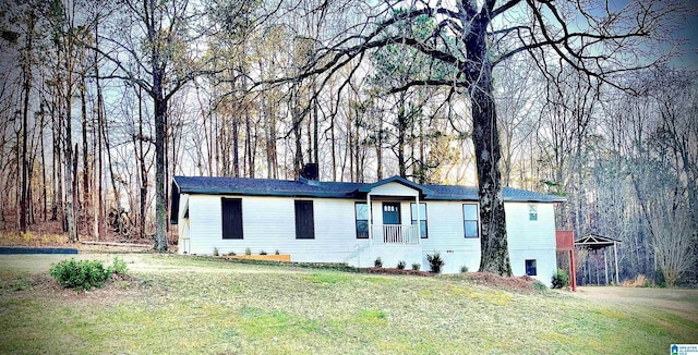 ranch-style house with a front lawn