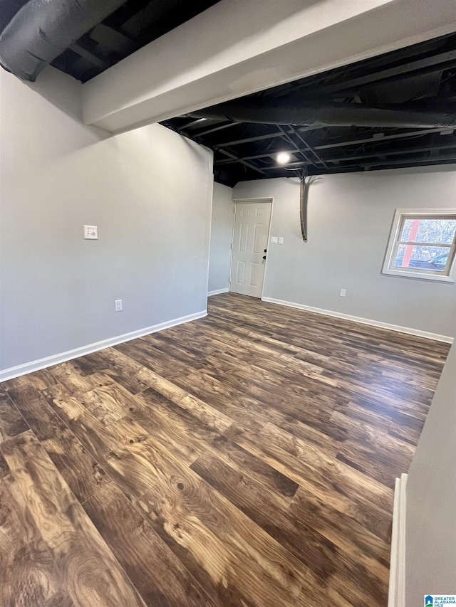 basement featuring hardwood / wood-style flooring