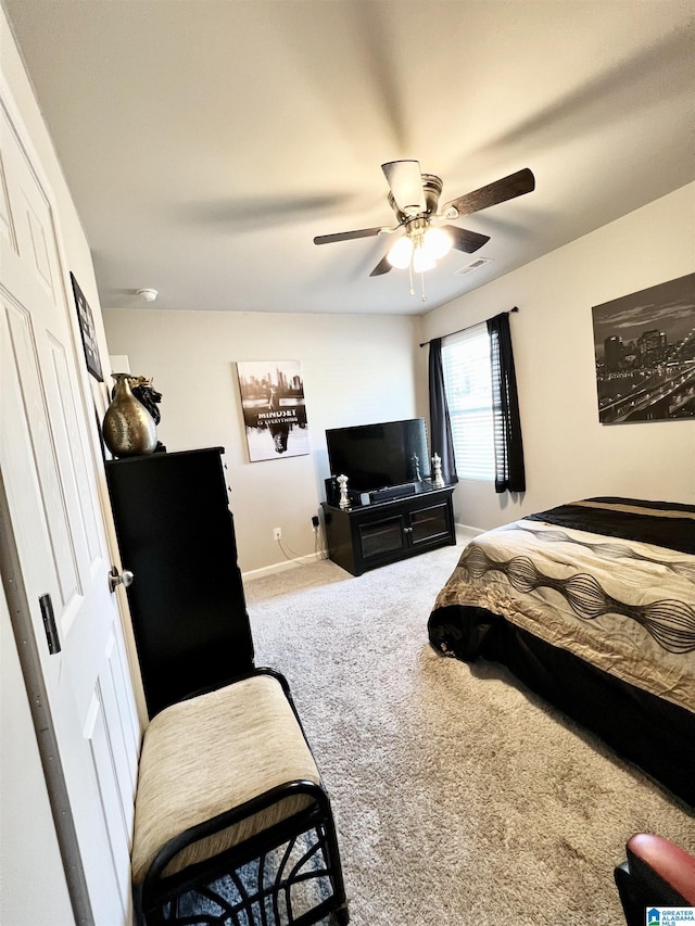 carpeted bedroom featuring ceiling fan