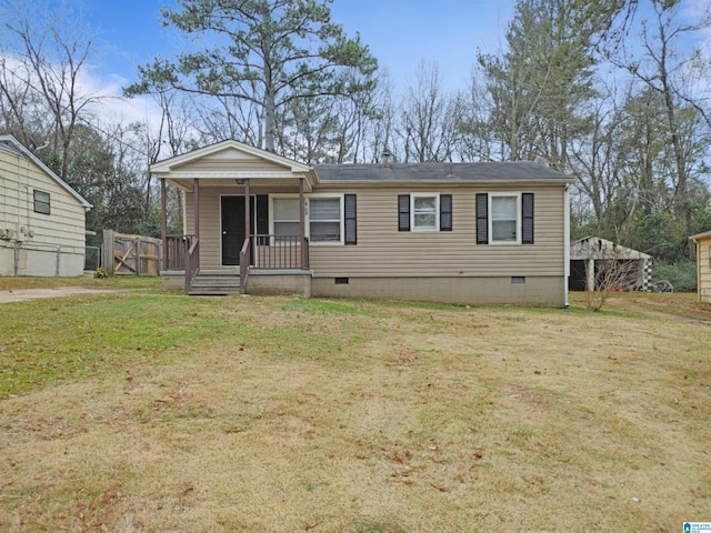 view of front facade with a front yard and a porch