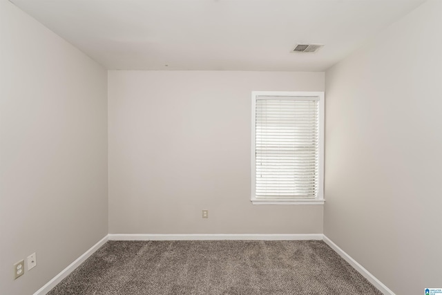 empty room featuring carpet floors