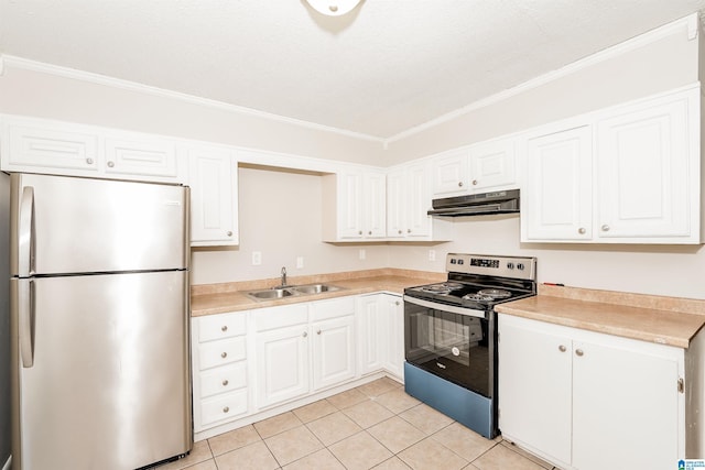 kitchen with ornamental molding, stainless steel appliances, sink, light tile patterned floors, and white cabinetry