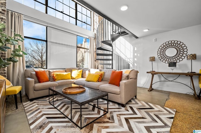 living room featuring concrete flooring