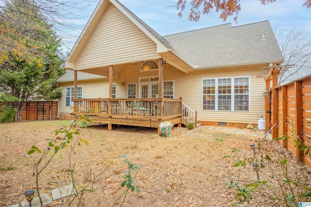 back of property featuring a deck