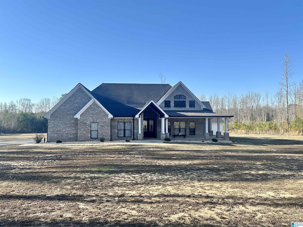 view of front of home featuring covered porch