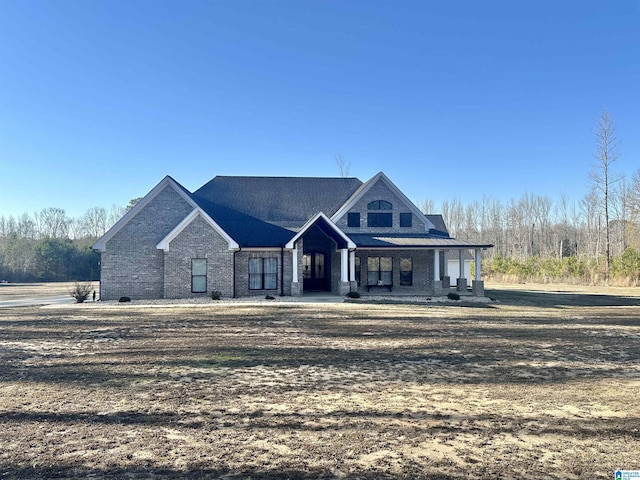 view of front of home featuring covered porch