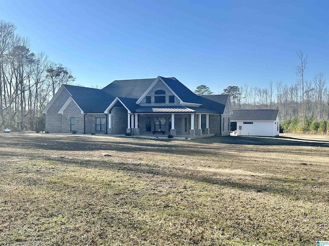 view of front facade with a front yard and a garage