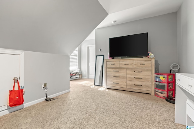 interior space featuring vaulted ceiling