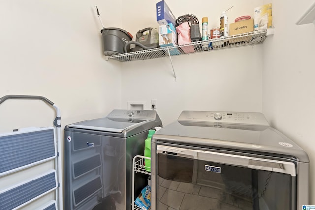 laundry room featuring independent washer and dryer