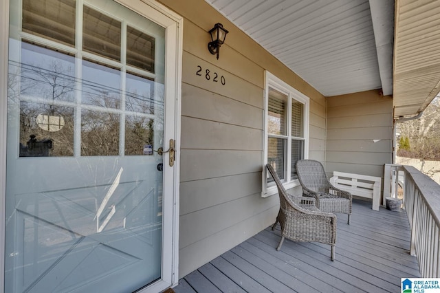 wooden deck with a porch