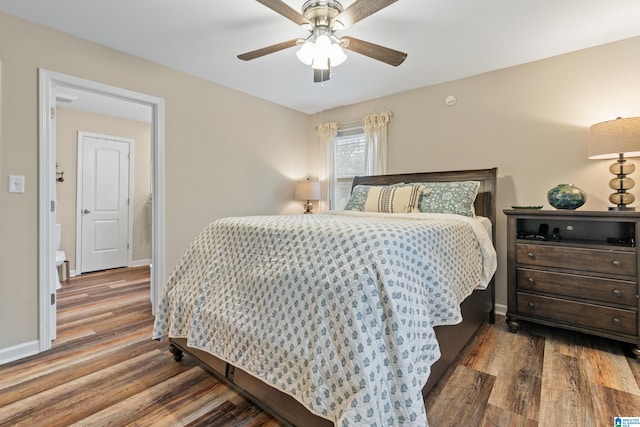 bedroom featuring hardwood / wood-style flooring and ceiling fan