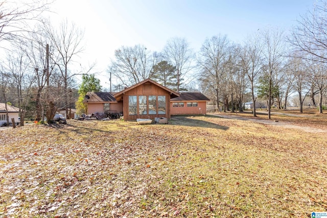 exterior space featuring a front lawn