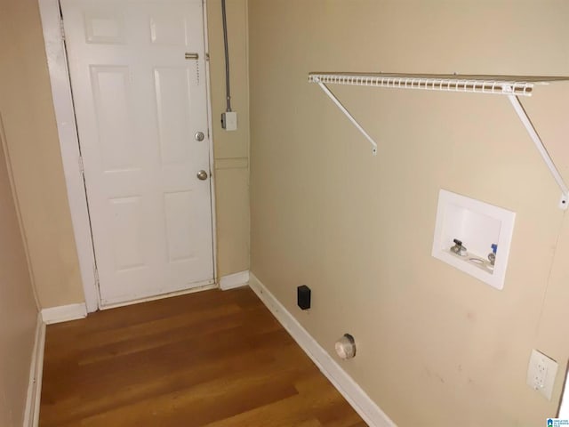 laundry area featuring washer hookup and hardwood / wood-style floors