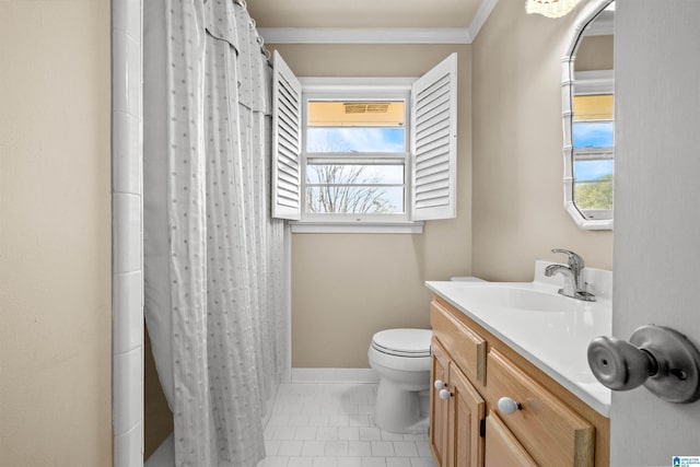 bathroom with vanity, ornamental molding, walk in shower, and a wealth of natural light