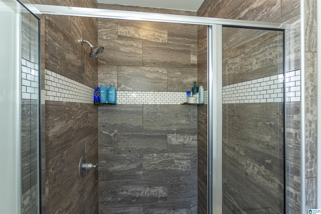 bathroom featuring an enclosed shower