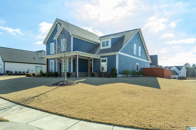 view of front property with a front lawn