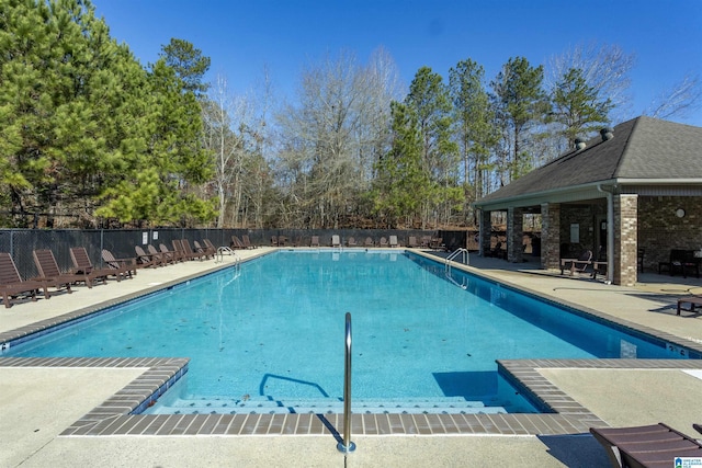 view of swimming pool featuring a patio