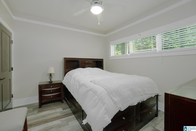 bedroom featuring light wood-type flooring and ceiling fan