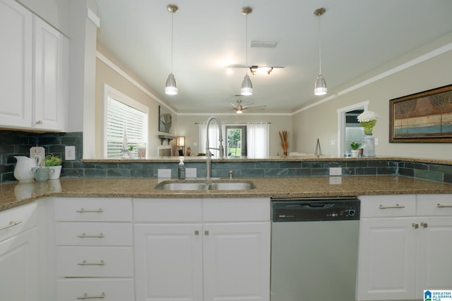 kitchen featuring pendant lighting, dishwasher, ceiling fan, and white cabinetry