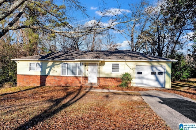 ranch-style house featuring a garage