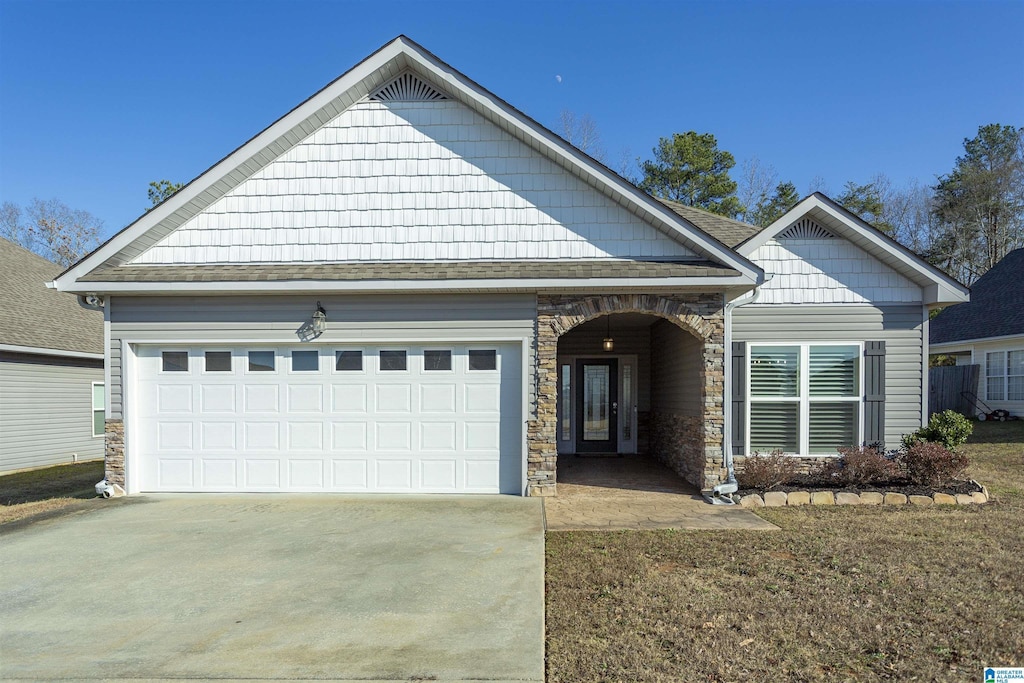 craftsman house featuring a garage