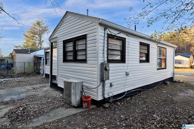 view of home's exterior with ac unit