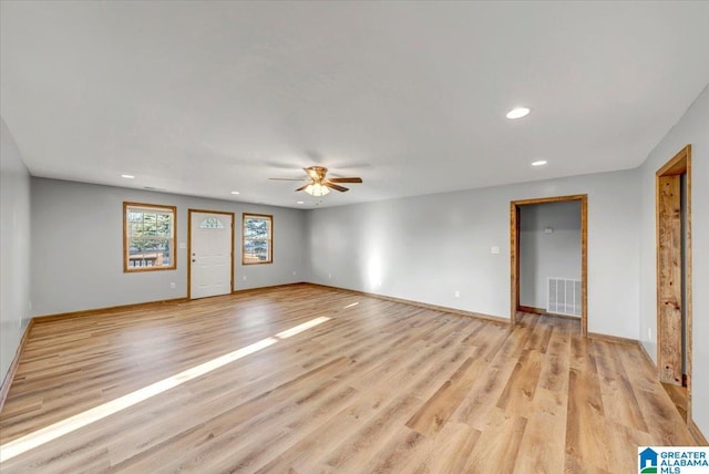 interior space featuring ceiling fan and light wood-type flooring