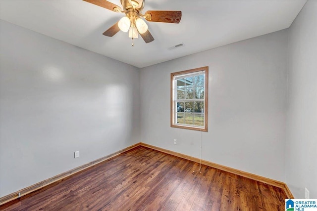 empty room with wood-type flooring and ceiling fan