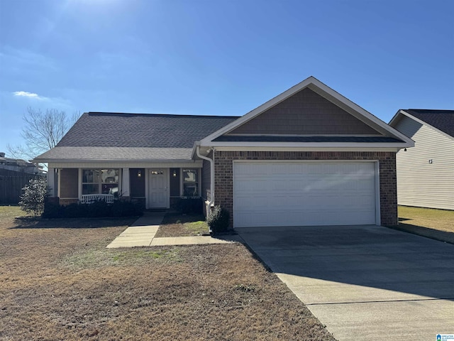 view of front of home with covered porch and a garage