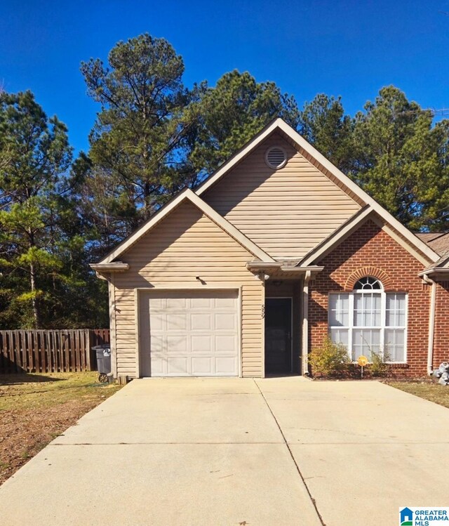 view of front of property with a garage