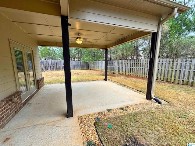 view of patio / terrace with ceiling fan and french doors