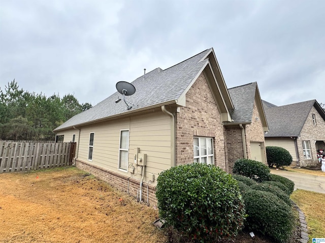 view of property exterior with a garage