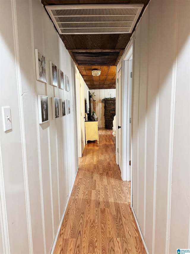 hallway with light wood-type flooring