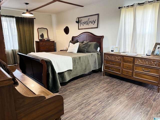 bedroom featuring dark hardwood / wood-style floors