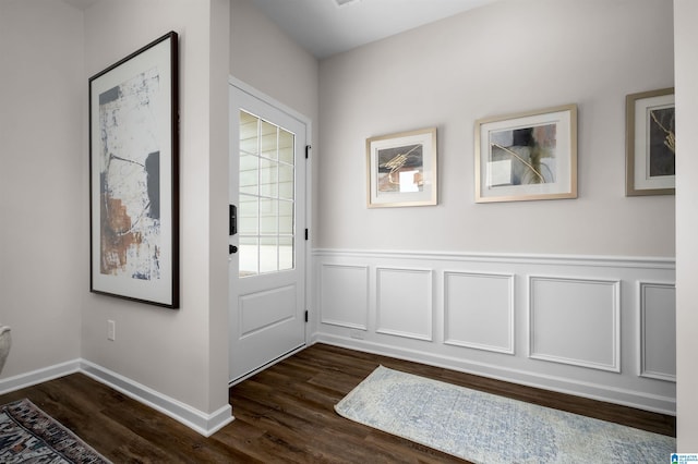 doorway featuring dark wood-type flooring