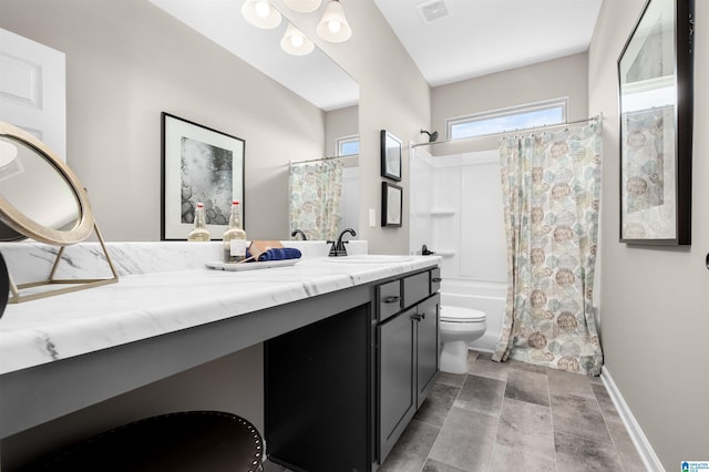 full bathroom featuring shower / bath combination with curtain, toilet, and vanity