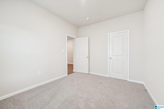 unfurnished bedroom featuring carpet floors