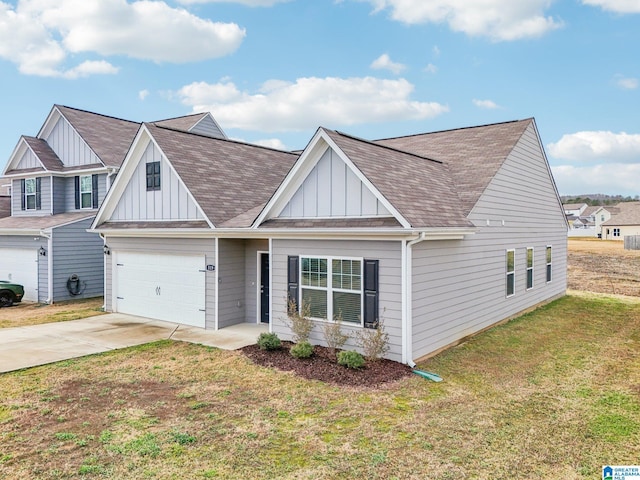 view of front of home with a garage and a front lawn