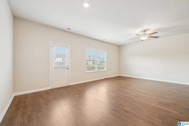 interior space featuring ceiling fan and dark hardwood / wood-style flooring