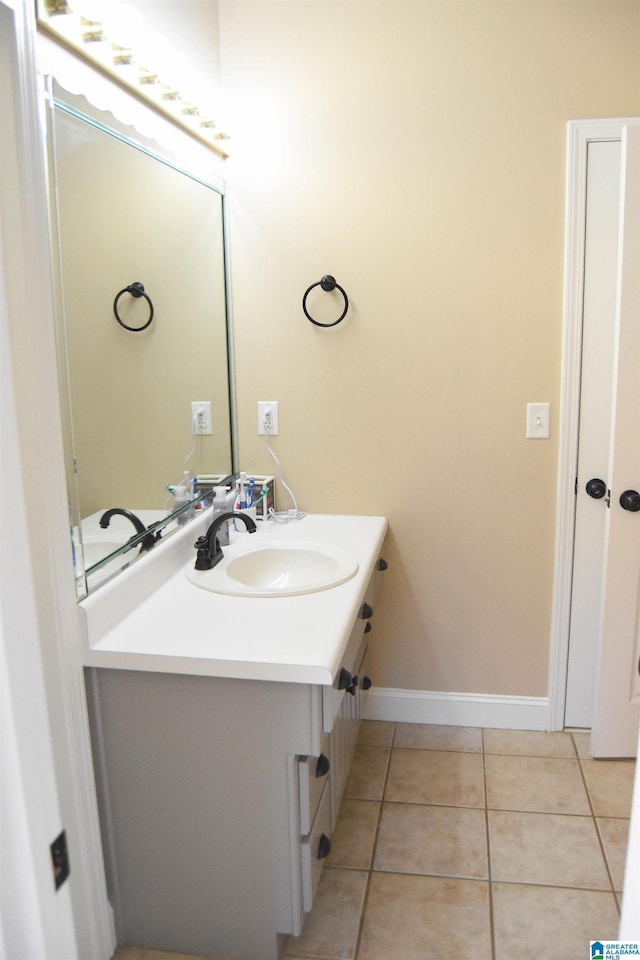 bathroom featuring tile patterned floors and vanity