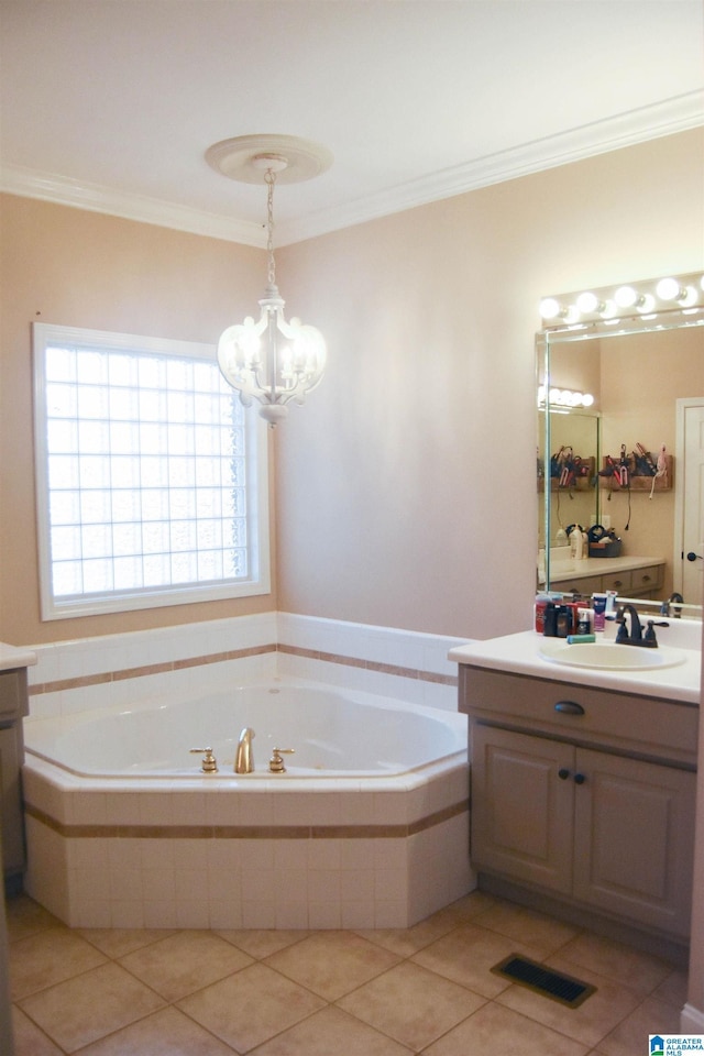 bathroom featuring tile patterned floors, ornamental molding, vanity, an inviting chandelier, and tiled bath