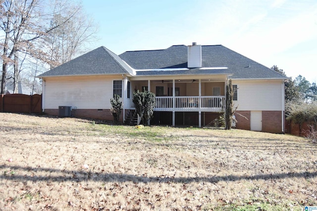 rear view of property with ceiling fan and central air condition unit