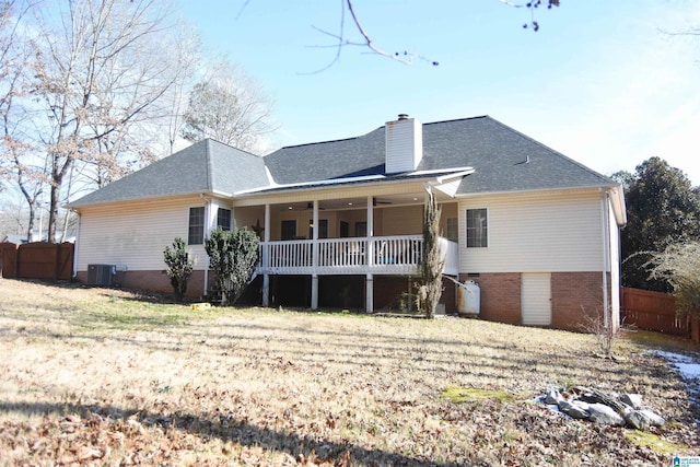 rear view of house with central air condition unit