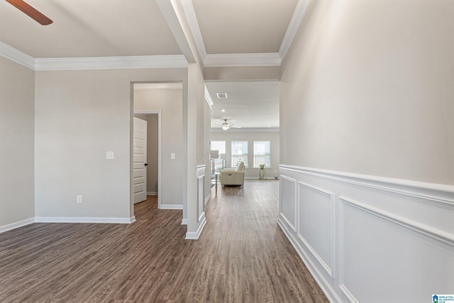 hallway featuring dark hardwood / wood-style flooring and ornamental molding