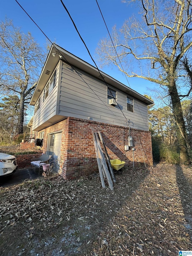 view of property exterior featuring a garage