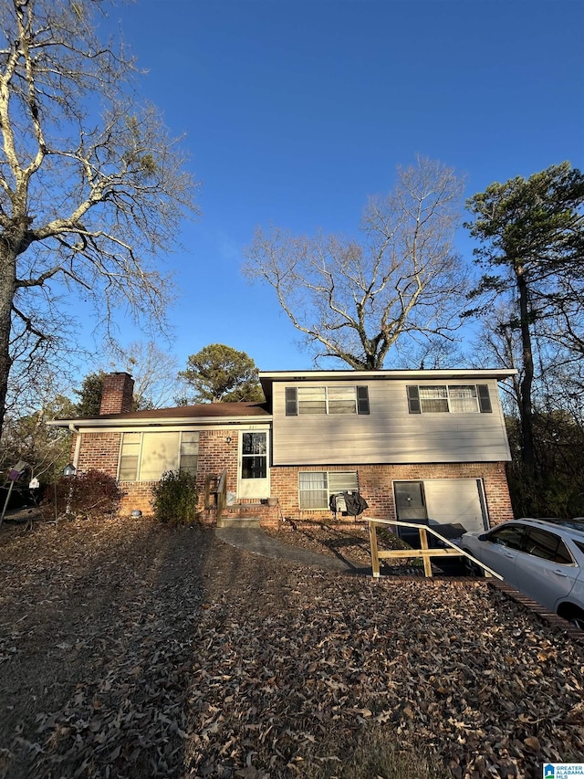 tri-level home featuring a garage