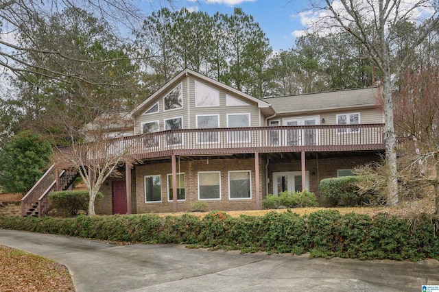 view of front of house with a wooden deck